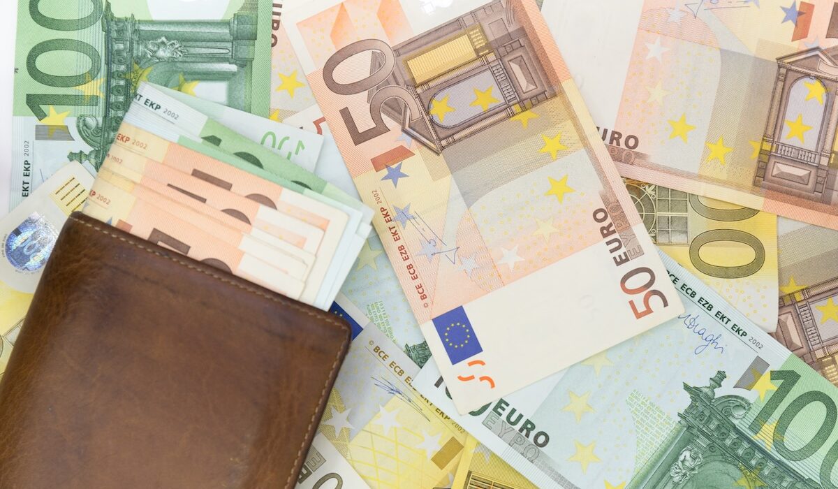 euro money with brown wallet